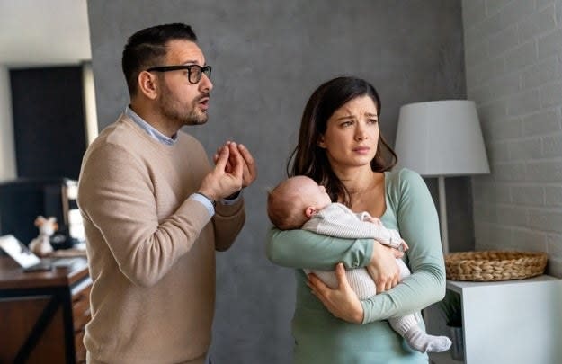 Couple with baby fighting