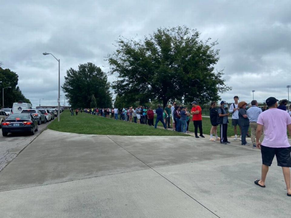 Parents at Henry Clay High School in Lexington waited in line to pick up their children after a bomb threat was made against four Fayette County schools Tuesday.