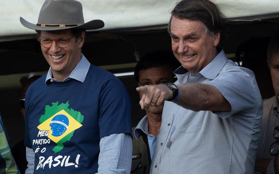 Ricardo Salles in a Stetson-style cowboy hat, and President of Brazil, Jair Bolsonaro 