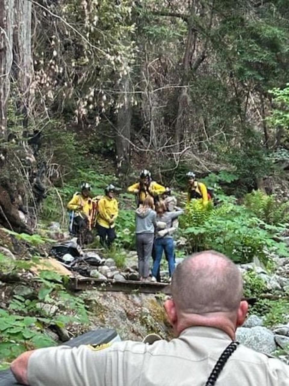 34-year-old Lukas McClish reunites with his family after getting lost in the Californian wilderness for around 10 days (Cal Fire CZU San Mateo-Santa Cruz Unit)