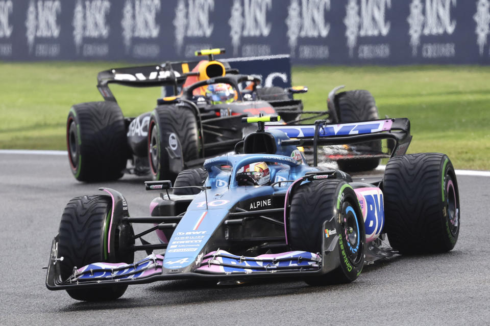 Alpine driver Pierre Gasly of France, right, steers his car during the sprint race ahead of the Formula One Grand Prix at the Spa-Francorchamps racetrack in Spa, Belgium, Saturday, July 29, 2023. The Belgian Formula One Grand Prix will take place on Sunday. (AP Photo/Geert Vanden Wijngaert)