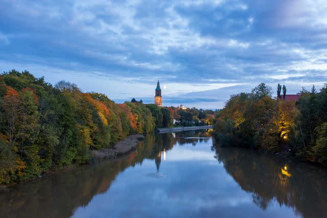 <p>Jaarmo Piironen/iStockphoto/Getty Images</p> The Aura River as it flows through the Finnish city of Turku, with the Turku Cathedral in the distance.