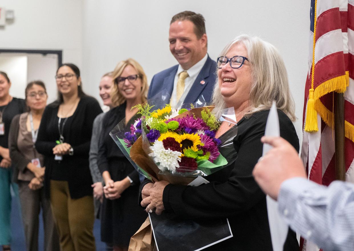 San Joaquin County Office of Education Assistant Superintendent of Education Services Jane Steinkamp, right, is surprised with the announcement that she is the recipient of the 2022 ATHENA Award. Steinkamp was leading a teachers workshop at the SJCOE when she got news of the honor.