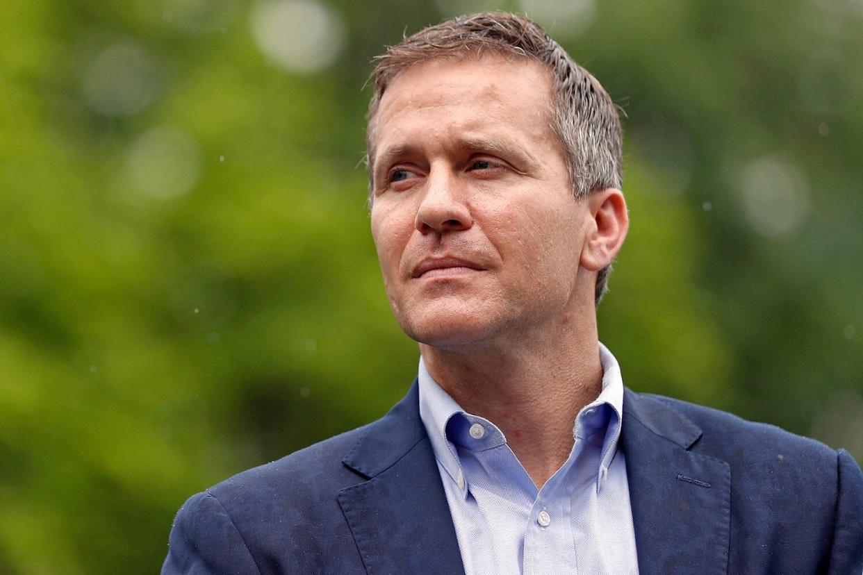 2018 file photo, Missouri Gov. Eric Greitens looks on before speaking at an event near the capitol in Jefferson City, Mo. Greitens, a sometimes brash outsider whose unconventional resume as a Rhodes Scholar and Navy SEAL officer made him a rising star in Republican politics, abruptly announced his resignation Tuesday, May 29, 2018, after a scandal involving an affair with his former hairdresser led to a broader investigation by prosecutors and state legislators.