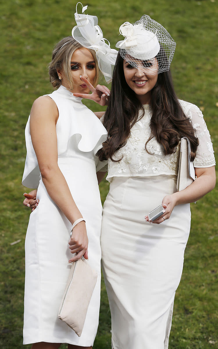 Shades of white were a popular Ladies Day trend at Aintree and these two took the look head to toe.