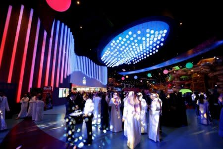 FILE PHOTO: Saudi people are seen at Riyadh Park mall during the opening of a cinema, in Riyadh, Saudi Arabia April 30, 2018. REUTERS/Faisal Al Nasser/File Photo