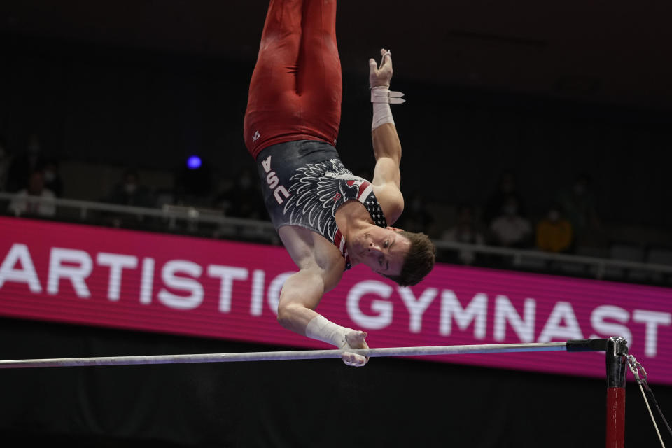 Brody Malone, of the U.S., competes in the horizontal bar during the men's apparatus finals of the FIG Artistic Gymnastics World Championships in Kitakyushu, western Japan, Sunday, Oct. 24, 2021. (AP Photo/Hiro Komae)