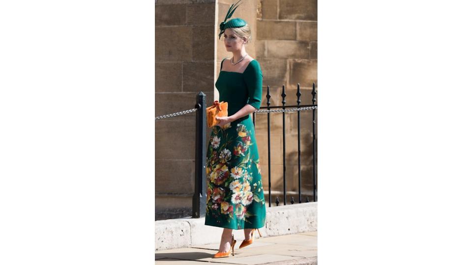 Lady Kitty Spencer in a green dress and orange heels at Prince Harry's wedding