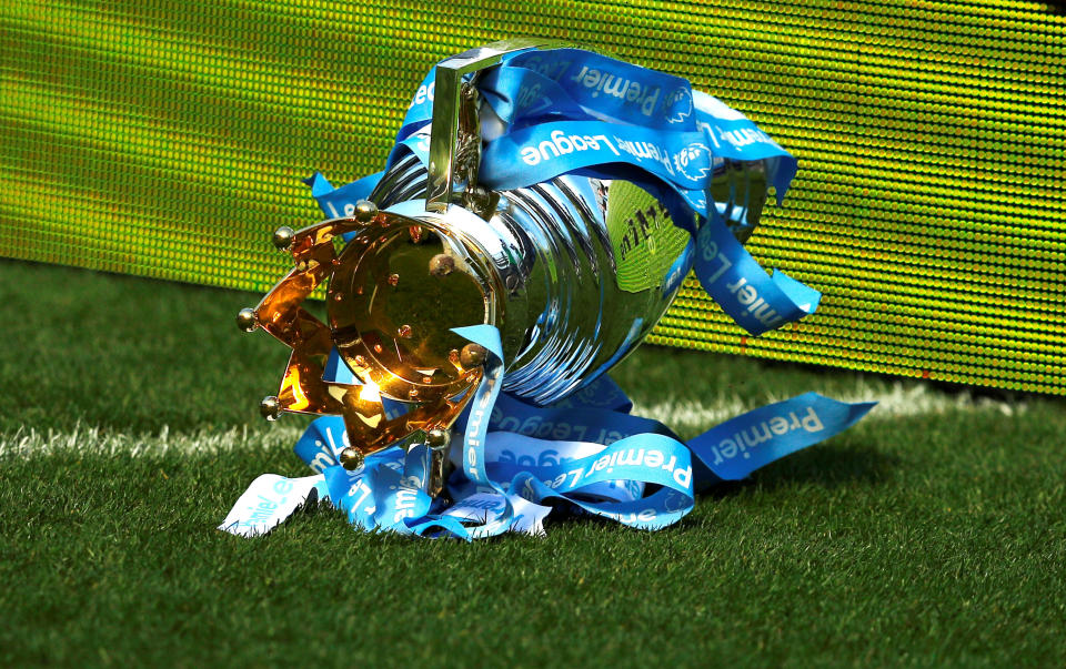 <p>Soccer Football – Premier League – Manchester City vs Huddersfield Town – Etihad Stadium, Manchester, Britain – May 6, 2018 The Premier League trophy on the pitch after falling during Manchester City’s celebrations REUTERS/Phil Noble EDITORIAL USE ONLY. No use with unauthorized audio, video, data, fixture lists, club/league logos or “live” services. Online in-match use limited to 75 images, no video emulation. No use in betting, games or single club/league/player publications. Please contact your account representative for further details. </p>