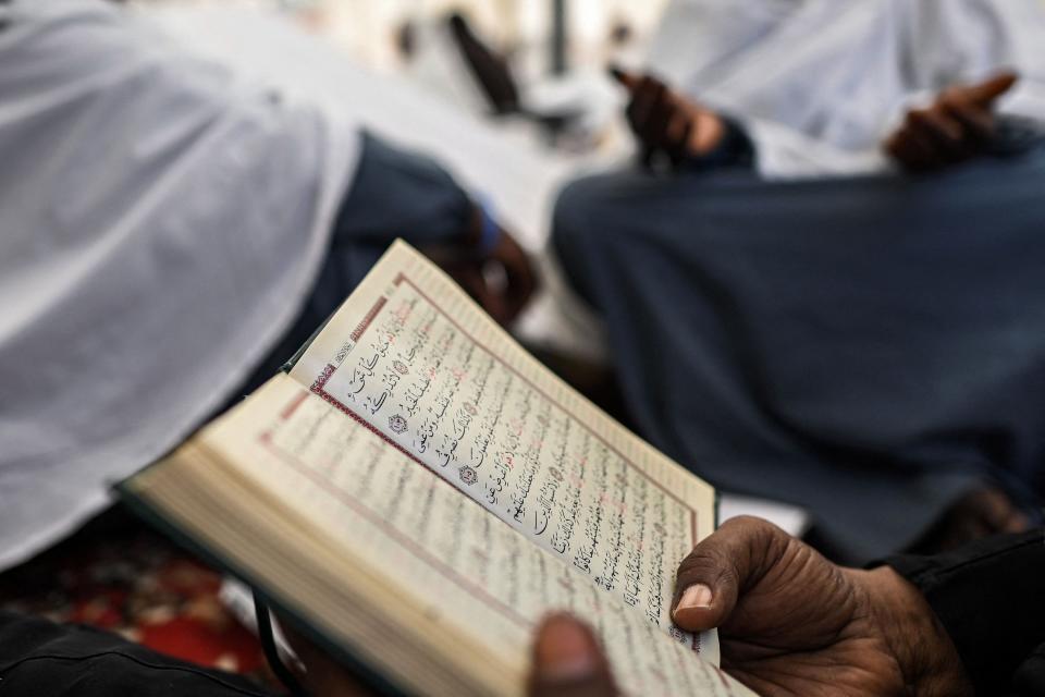 Muslim pilgrims pray upon their arrival in Mina, near Islam's holy city of Mecca on June 26, 2023, for the annual Hajj pilgrimage.