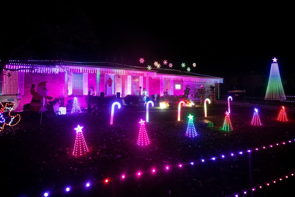 A house decorated for Christmas on Woodgate Way in Tallahassee, Fla. as seen on Thursday, Dec. 9, 2022. 