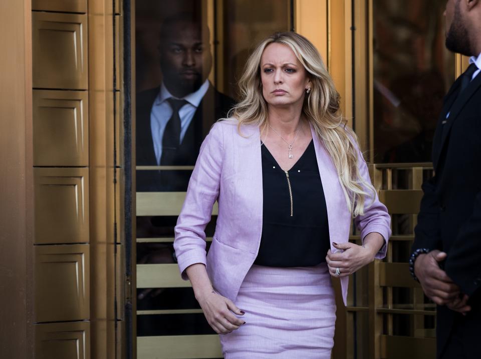 Adult film actress Stormy Daniels (Stephanie Clifford) exits the United States District Court Southern District of New York for a hearing related to Michael Cohen, President Trump's longtime personal attorney and confidante, April 16, 2018 in New York City.