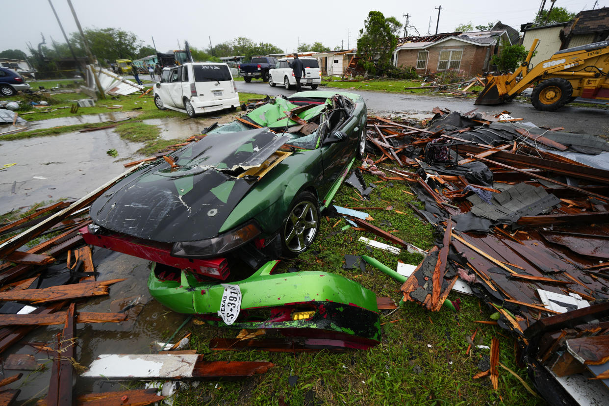 Damage is seen after a tornado hit Saturday, May 13, 2023, in the unincorporated community of Laguna Heights, Texas near South Padre Island. Authorities say one person was killed when a tornado struck the southernmost tip of Texas on the Gulf coast. (AP Photo/Julio Cortez)