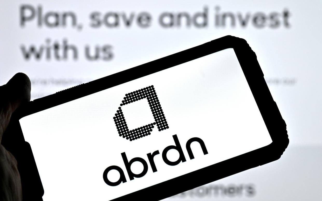 The abrdn logo a smartphone screen