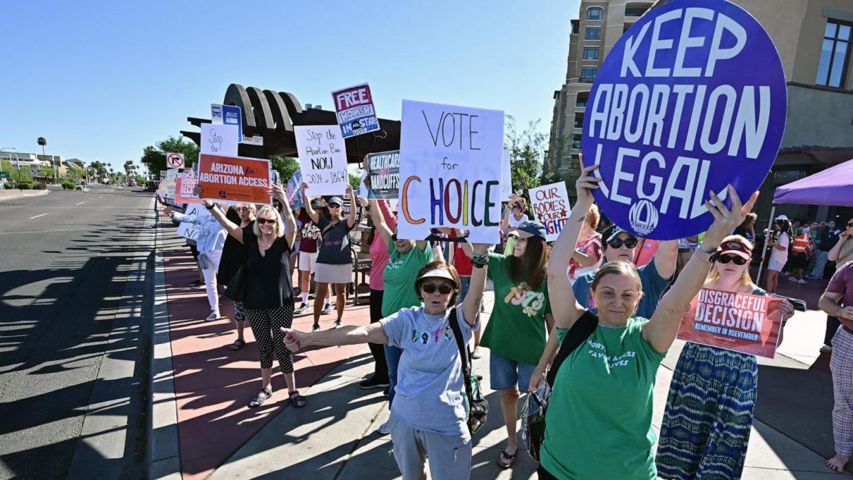 PHOTO: Pro-abortion rights demonstrators rally in Scottsdale, Arizona, on April 15, 2024. (Frederic J. Brown/AFP via Getty Images)