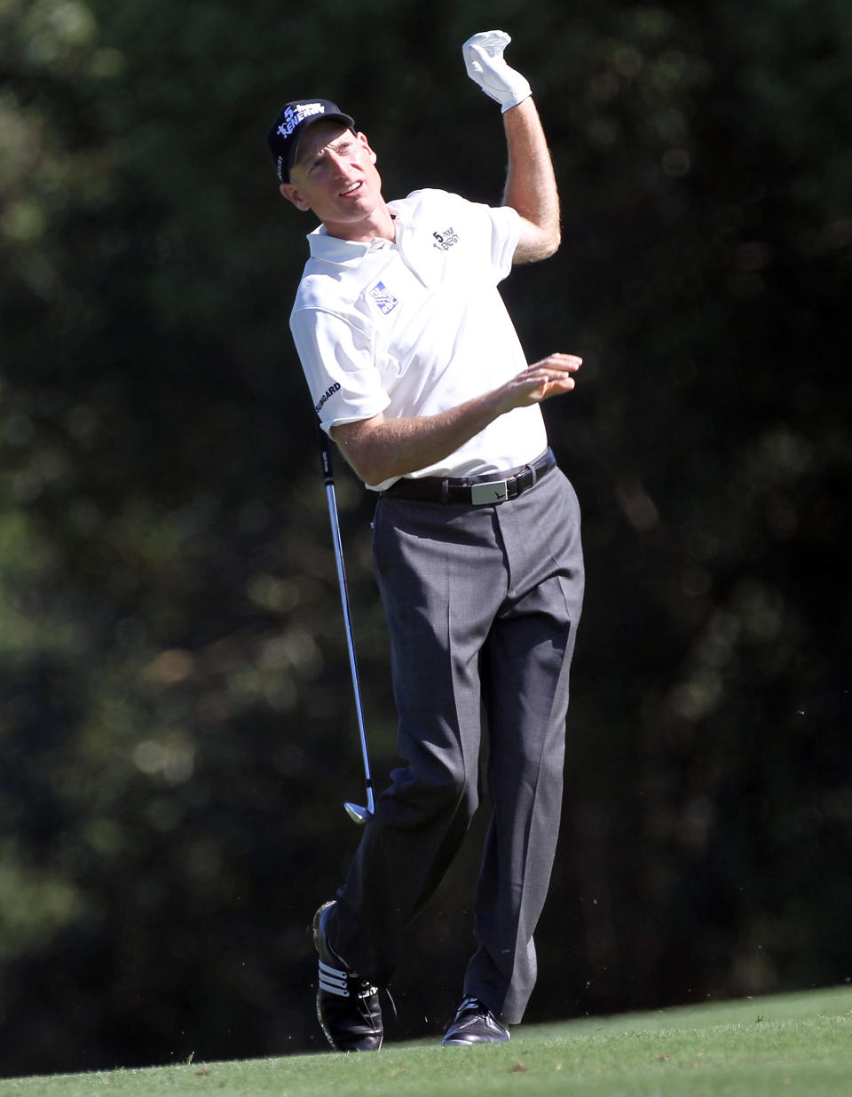 PALM HARBOR, FL - MARCH 16: Jim Furyk loses his club after making a shot on the 7th hole during the second round of the Transitions Championship at Innisbrook Resort and Golf Club on March 16, 2012 in Palm Harbor, Florida. (Photo by Sam Greenwood/Getty Images)