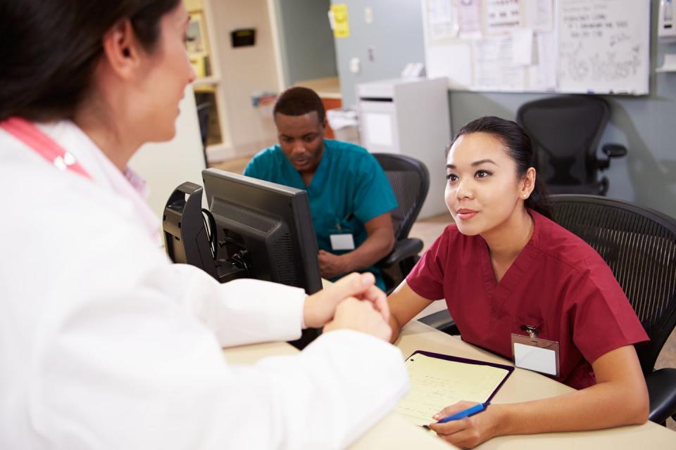 Health-care workers seen in a hospital.