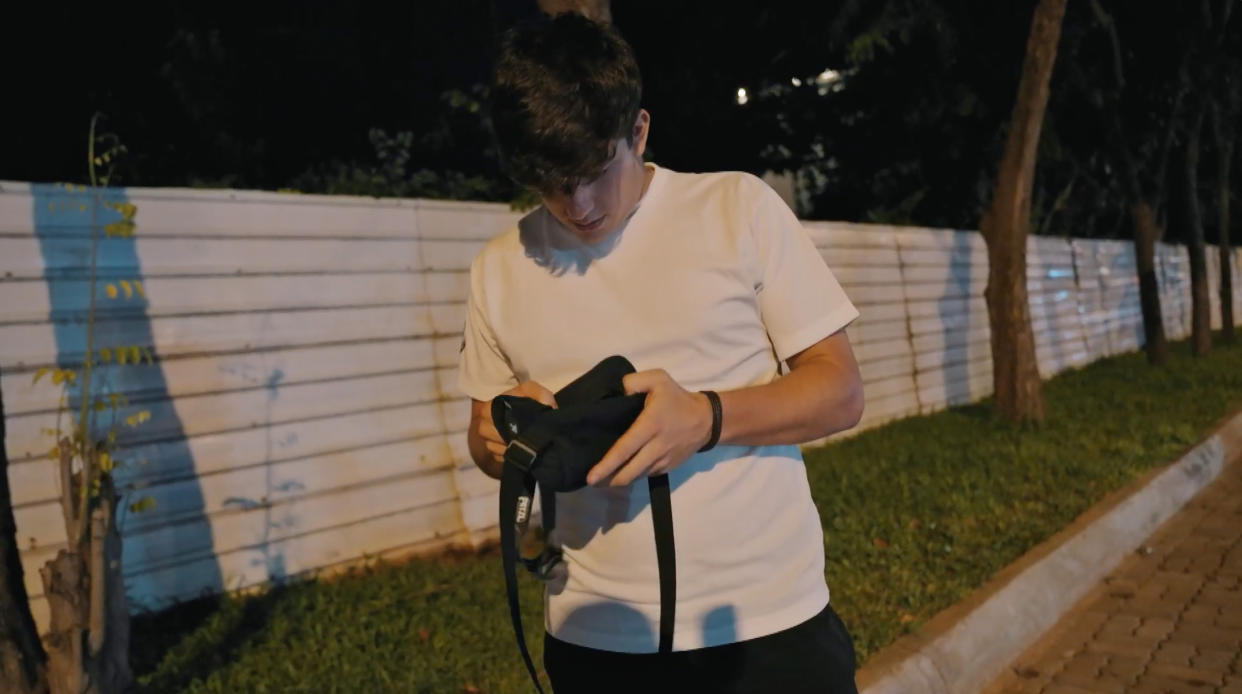 Race Across The World's James checking his money belt