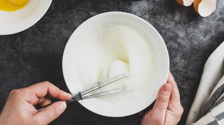 Whisking egg whites in a bowl