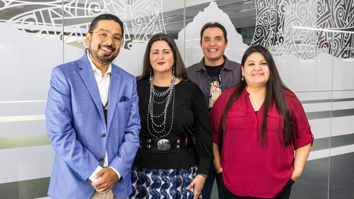 From left: Labriola Center director Alex Soto (Tohono O'odham) stands with center staff members Alycia de Mesa (Apache of Chihuahua, Mexican descent), Eric Hardy (Navajo) and Vina Begay (Diné) outside the newly remodeled center on Tuesday, March 26. (Photo/Charlie Leight/ASU News)