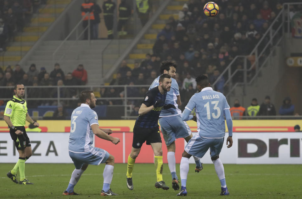 Inter Milan's Marcelo Brozovic scores with an header during an Italian Cup quarterfinal soccer match between Inter Milan and Lazio, at the San Siro stadium in Milan, Italy, Tuesday, Jan. 31, 2017. (AP Photo/Luca Bruno)