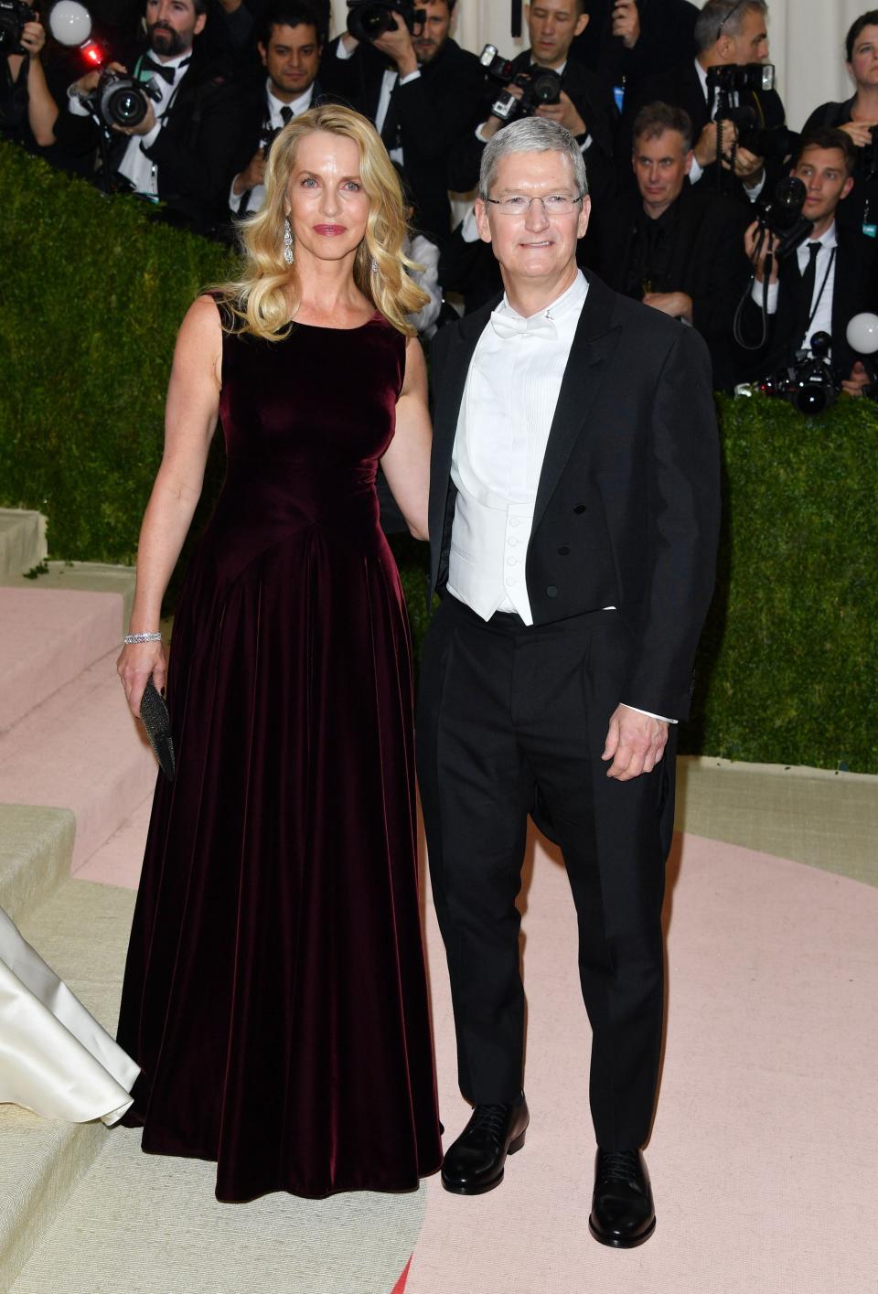 <h1 class="title">Laurene Powell Jobs and Tim Cook</h1><cite class="credit">Photo: Getty Images</cite>