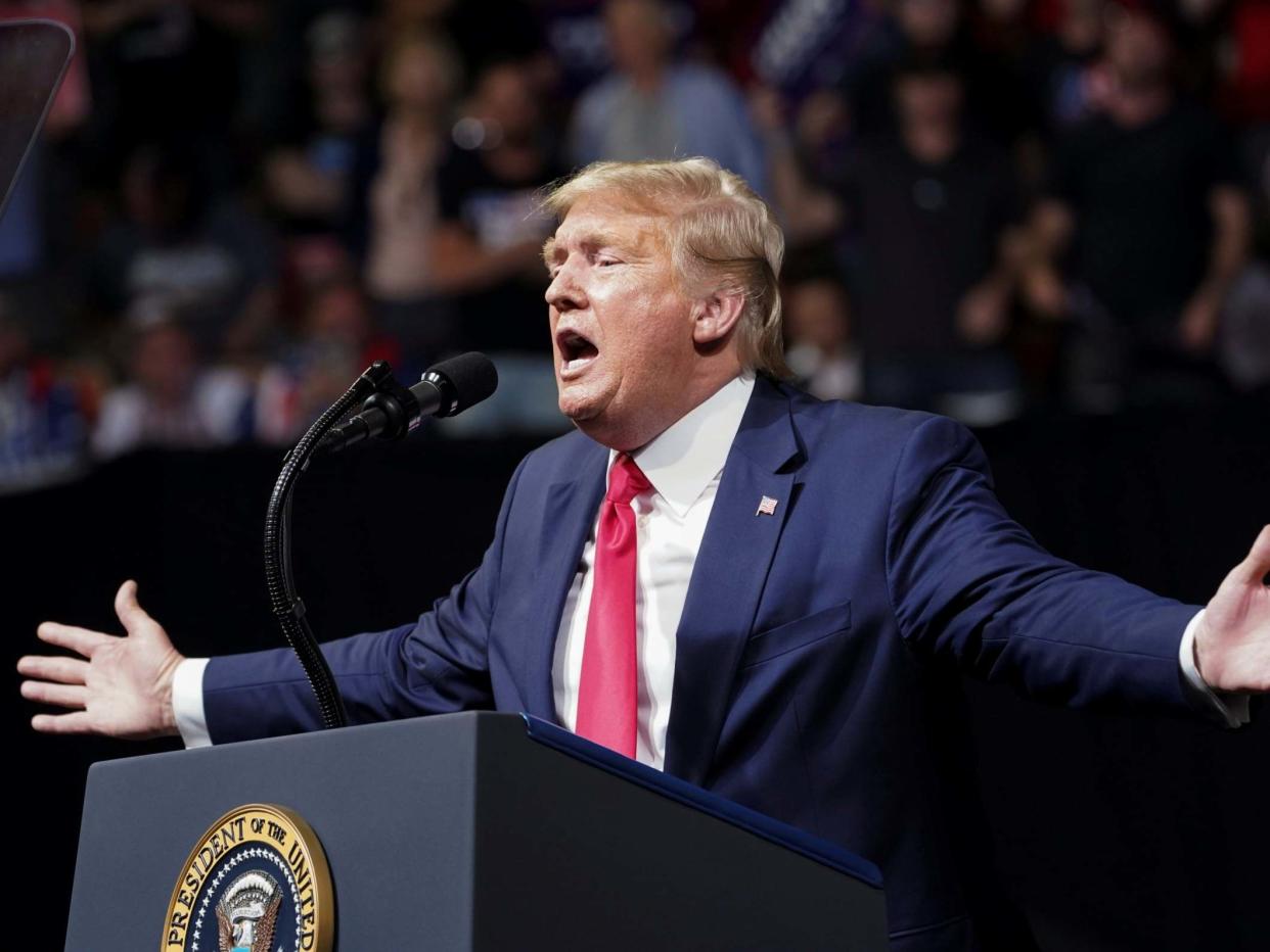 Donald Trump addresses a rally crowd in Phoenix, Arizona: Kevin Lamarque/Reuters