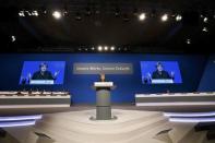 German Chancellor and leader of the conservative Christian Democratic Union party CDU Angela Merkel delivers her closing speech of the CDU party convention in Essen, Germany, December 7, 2016. REUTERS/Wolfgang Rattay