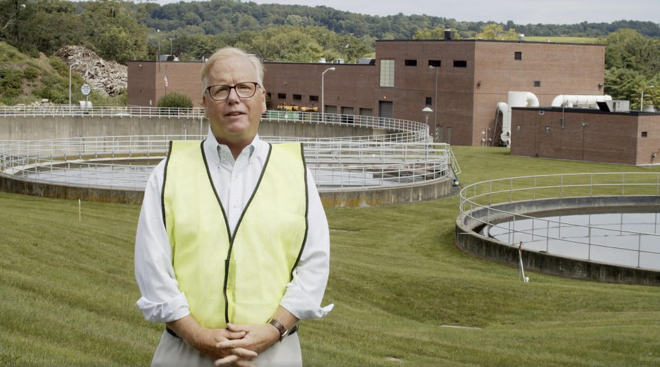 In this undated image taken from video, Danbury Mayor Mark Boughton stands in front of the Danbury Wastewater Treatment Plant in Danbury, Conn., as he announces a tongue-in-cheek move to rename the facility after John Oliver following the comedian's expletive-filled rant about the city. (Office of Mayor Mark Boughton via AP)