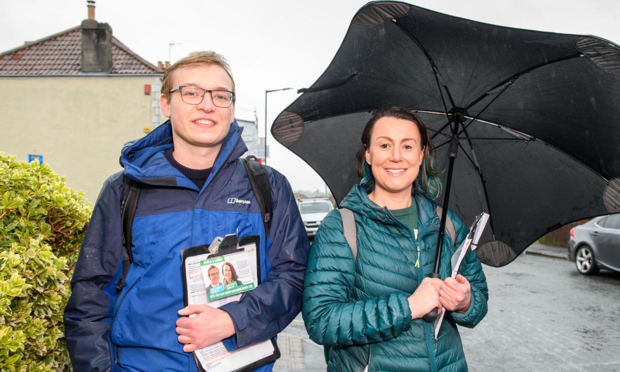 <span>Emma Edwards, the leader of the Greens on Bristol city council, and fellow councillor James Crawford canvassing in the rain in Bristol this week.</span><span>Photograph: Adrian Sherratt/The Guardian</span>