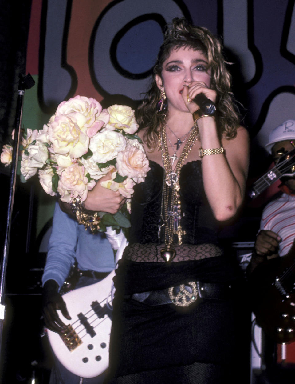 The singer wearing even more cross necklaces and rosaries during the after-party for the closing night of the Virgin tour.