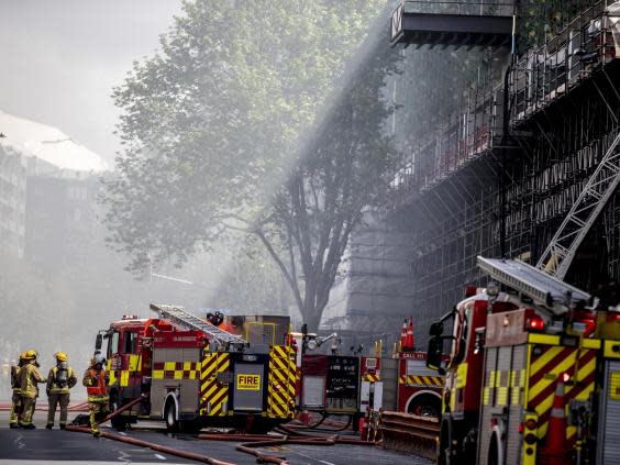 Several fire crews are battling the blaze (AP)