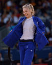 LONDON, ENGLAND - JULY 30: Automne Pavia of France celebrates after winning the Bronze Medal B in the Women's -57kg Judo on Day 3 of the London 2012 Olympic Games at ExCeL on July 30, 2012 in London, England. (Photo by David Finch/Getty Images)