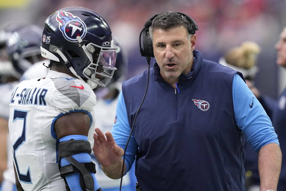 Tennessee Titans linebacker Azeez Al-Shaair (2) talks with head coach Mike Vrabel during the second half of an NFL football game against the Houston Texans, Sunday, Dec. 31, 2023, in Houston. (AP Photo/David J. Phillip)