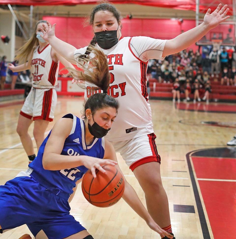 Noth Quincy's Caroline O'Donnell blocks Quincy's Antenella Ibrahim along the baseline during a game on Friday, Jan. 21, 2022