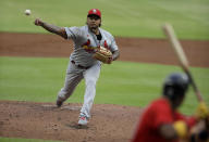 St. Louis Cardinals pitcher Carlos Martínez, left, pitches to Atlanta Braves' Ronald Acuna Jr. in the first inning of a baseball game Friday, June 18, 2021, in Atlanta. (AP Photo/Ben Margot)