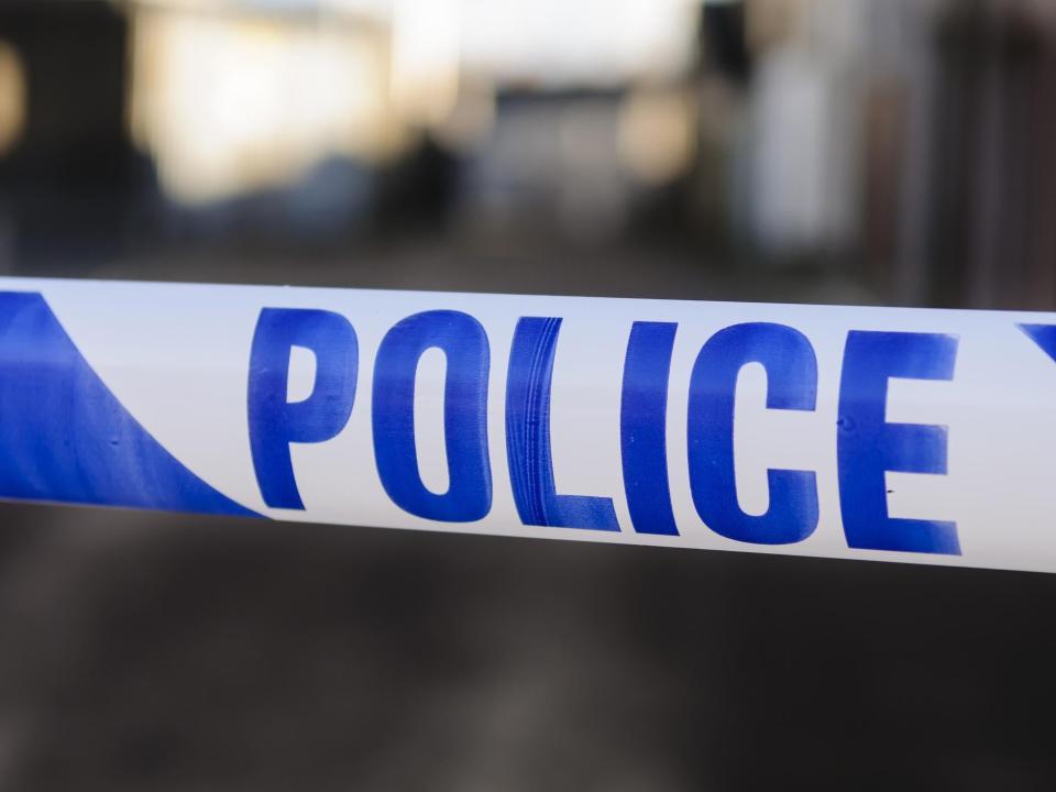 Police tape at the cordon across a crime scene: Getty Images/iStockphoto