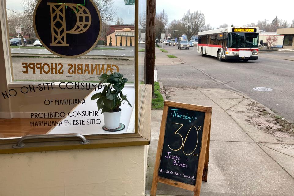 A 30% off on Thursdays sign is displayed outside Preserve Oregon, a Salem marijuana shop. Along the West Coast, which has dominated U.S. marijuana production from long before legalization, producers are struggling with what many call the failed economics of legal pot, a challenge inherent in regulating a product that remains illegal under federal law.