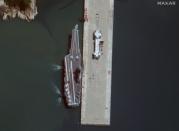 A November 19, 2019 satellite view of the Chinese aircraft carrier Shandong at Yulin Naval Base on Hainan Island