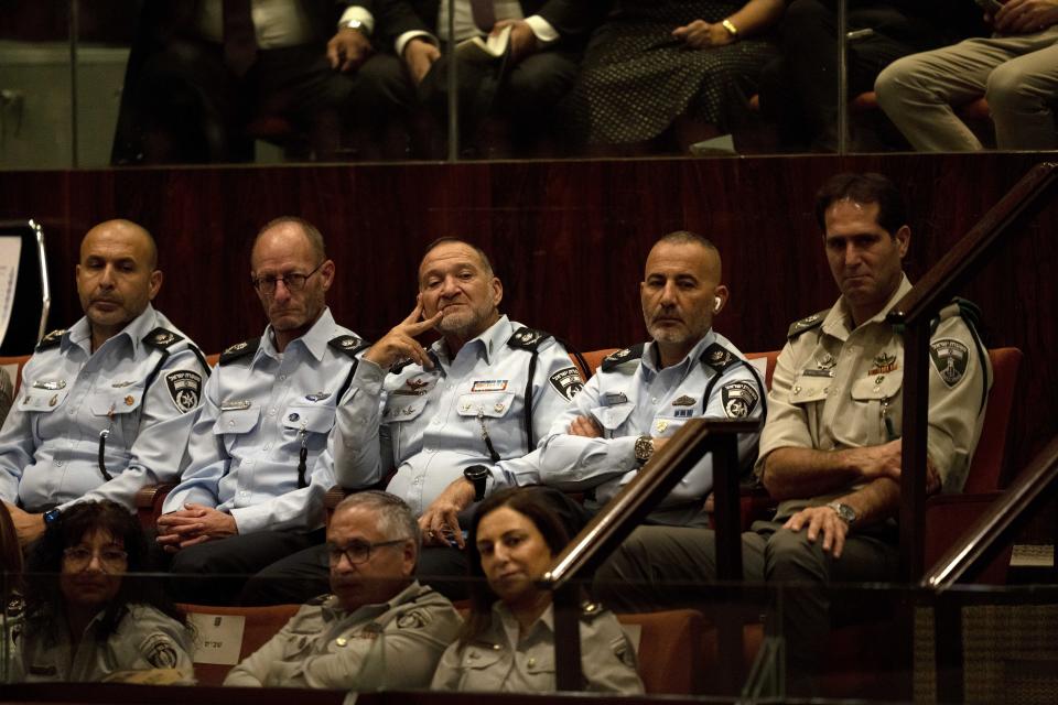 CORRECTS TO SWEARING-IN OF PARLIAMENT, NOT GOVERNMENT - Israeli Police Commissioner Yaakov Shabtai, center, attends the swearing-in ceremony for Israel's parliament, at the Knesset, in Jerusalem, Tuesday, Nov. 15, 2022. (AP Photo/ Maya Alleruzzo, Pool)