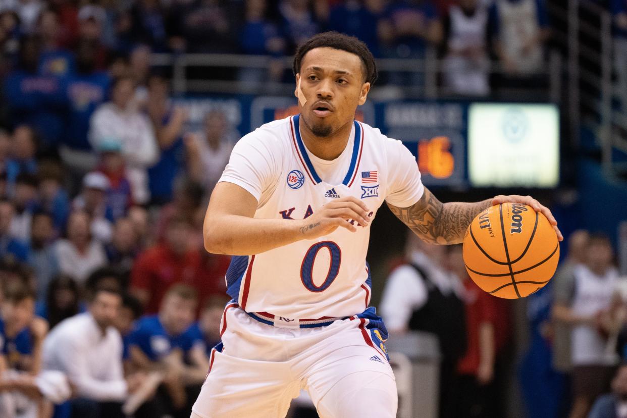 Kansas sophomore guard Bobby Pettiford Jr. (0) looks for an open pass in the first half of Tuesday's Sunflower Showdown against Kansas State inside Allen Fieldhouse.