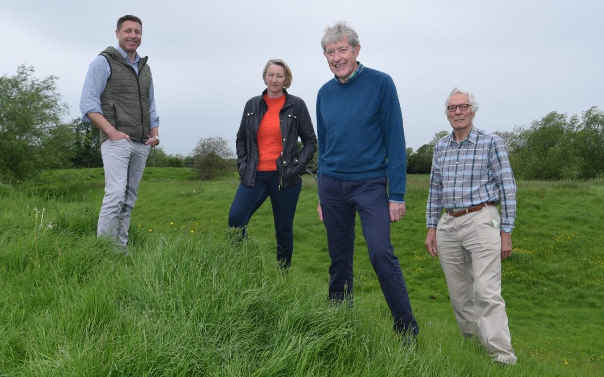 Bill Carruthers the chairman of Weston-sub-Edge's parish council (blue jumper) is leading the protests against the beauty spot being 'carved up' and sold off in lots - JAY WILLIAMS