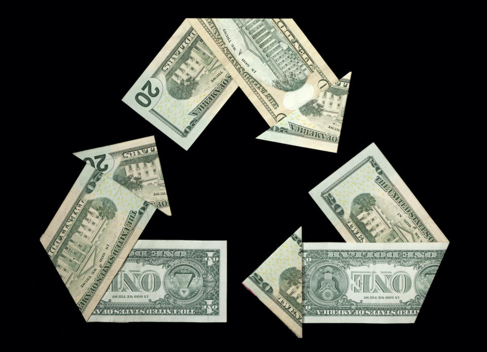 the recycle logo recreated in folded US currency no visible serial numbers/faces etc.