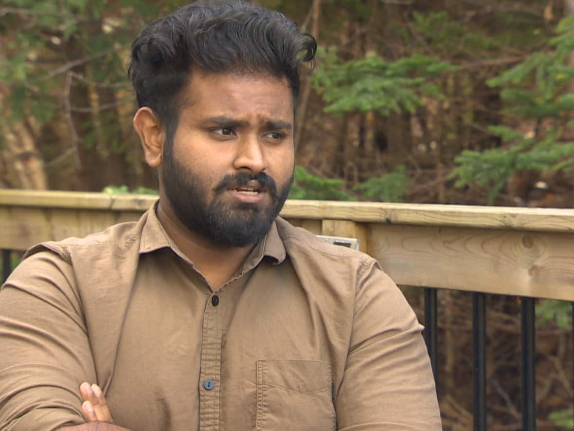 Finbin Joseph says he kept his passport in a safe space all the time, until he handed it to Canada Post. Now he's stuck in Canada as he tries to find the lost passport, or apply for a new one.  (CBC - image credit)