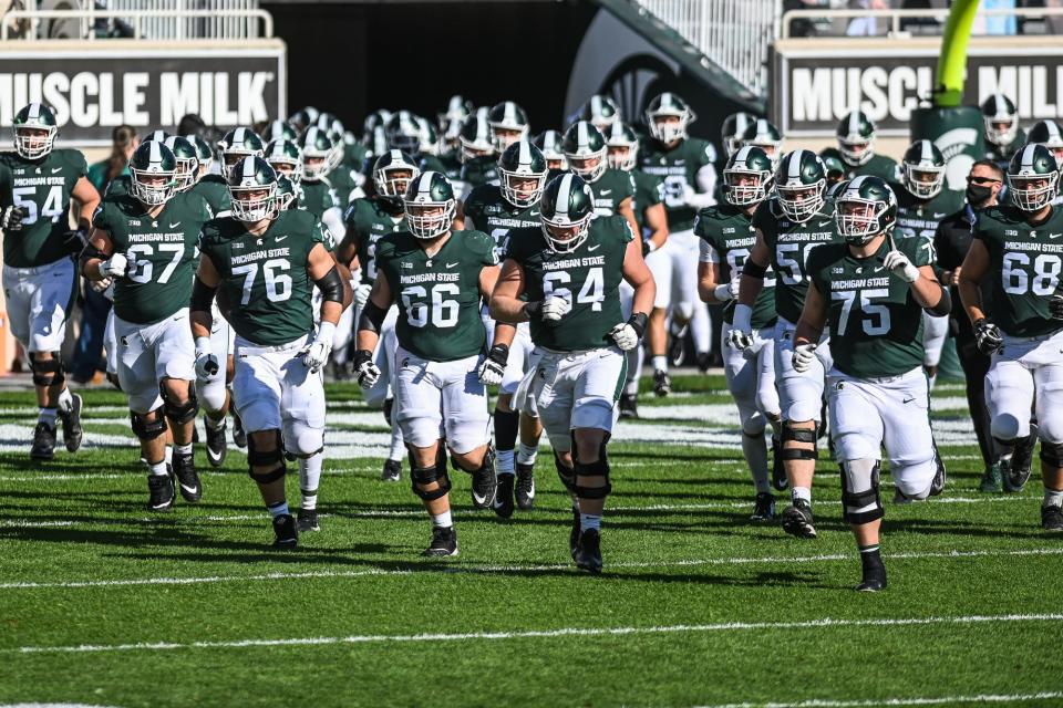 Michigan State takes the field before the game against Rutgers on Saturday, Oct. 24, 2020, at Spartan Stadium in East Lansing. 
