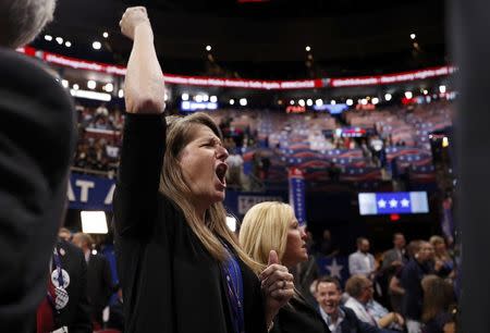 A delegate yells after the temporary chairman of the Republican National Convention announced that the convention would not hold a roll-call vote on the Rules Committee's report and rules changes and rejected the efforts of anti-Trump forces to hold such a vote at the Republican National Convention in Cleveland, Ohio, U.S. July 18, 2016. REUTERS/Mark Kauzlarich