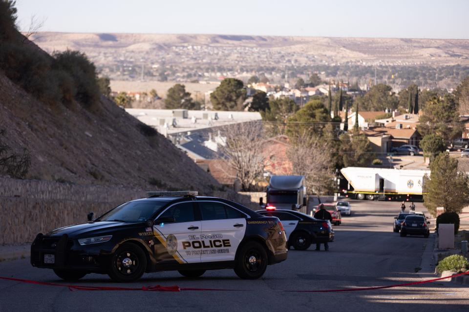 El Paso police block a street during an investigation into an officer-involved shooting during a trespassing call on Tuesday, Feb. 20, on Royal Arms Drive in West El Paso.