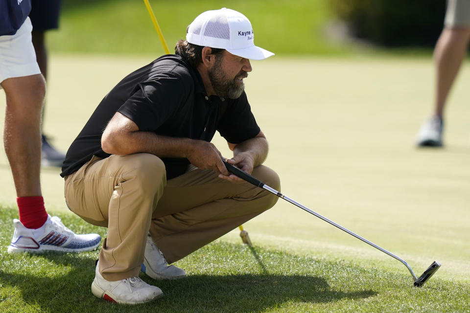 Erik Compton lines up a putt on the 17th green during the first round of the Honda Classic golf tournament, Thursday, Feb. 24, 2022, in Palm Beach Gardens, Fla. (AP Photo/Lynne Sladky)