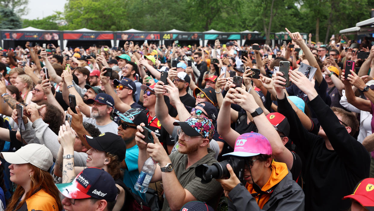 MONTREAL, QUEBEC - JUNE 16: A crowd enjoys the atmosphere at the fan stage prior to practice ahead of the F1 Grand Prix of Canada at Circuit Gilles Villeneuve on June 16, 2023 in Montreal, Quebec. (Photo by Bryn Lennon - Formula 1/Formula 1 via Getty Images)