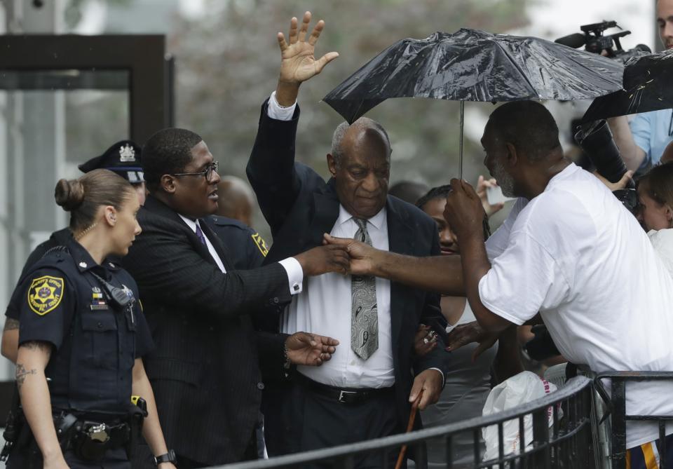 <p>Bill Cosby raises his hand as he exits the Montgomery County Courthouse after a mistrial was declared in Norristown, Pa., Saturday, June 17, 2017. Cosby’s trial ended without a verdict after jurors failed to reach a unanimous decision. (AP Photo/Matt Slocum) </p>